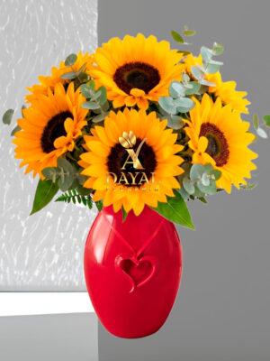 Arreglo Floral con 8 Girasoles mas fino follaje en base de cerámica